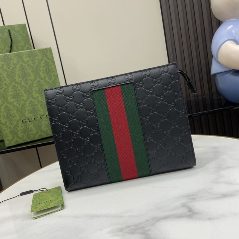 G*u*i clutch bags
